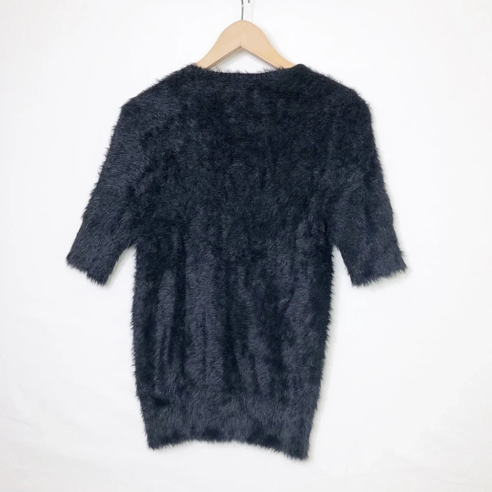 Knitted and knotted black, eyelash, scoop, neck sweater
